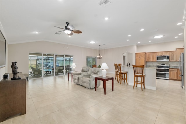 3097 Bureau Path, The Villages, FL 32163 - living area with ceiling fan, ornamental molding, arched walkways, light tile patterned floors, and recessed lighting