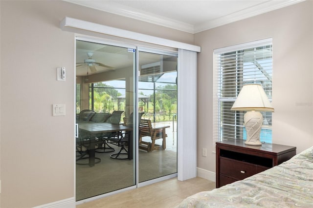 3097 Bureau Path, The Villages, FL 32163 - bedroom with access to outside, ornamental molding, baseboards, and light tile patterned flooring