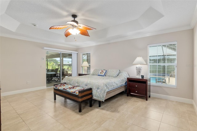3097 Bureau Path, The Villages, FL 32163 - bedroom featuring a raised ceiling, access to exterior, crown molding, baseboards, and light tile patterned floors