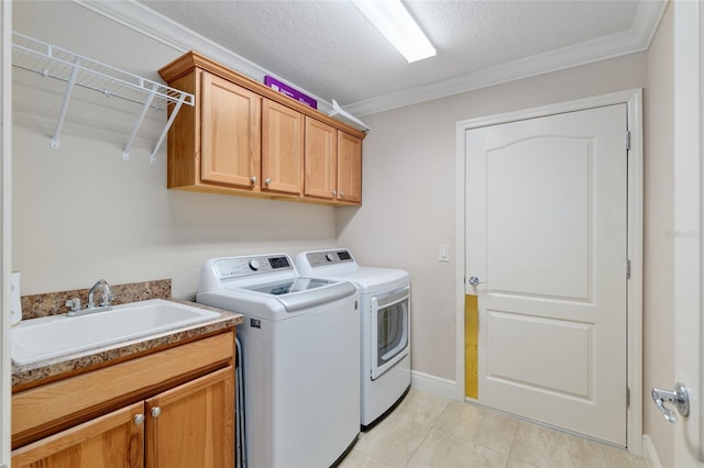 3097 Bureau Path, The Villages, FL 32163 - washroom featuring washing machine and dryer, cabinet space, ornamental molding, light tile patterned floors, and baseboards