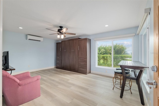 3097 Bureau Path, The Villages, FL 32163 - sitting room featuring an AC wall unit, baseboards, a ceiling fan, light wood-style flooring, and recessed lighting