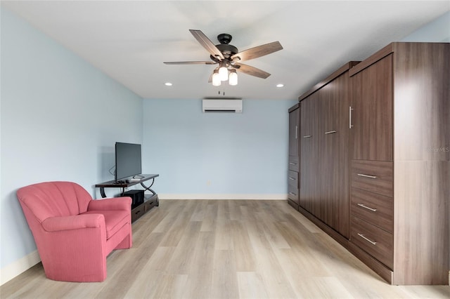 3097 Bureau Path, The Villages, FL 32163 - living area with a wall mounted air conditioner, ceiling fan, light wood-style floors, baseboards, and recessed lighting