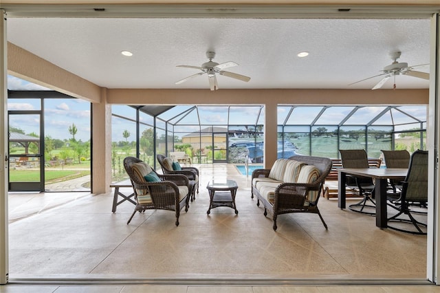 3097 Bureau Path, The Villages, FL 32163 - sunroom featuring ceiling fan and an outdoor hangout area