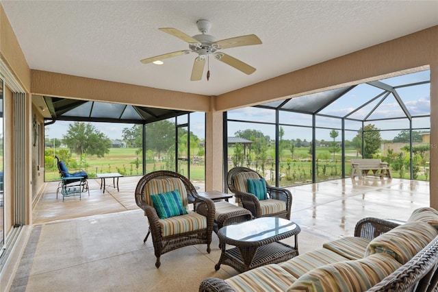 3097 Bureau Path, The Villages, FL 32163 - view of patio featuring ceiling fan, a lanai, and an outdoor hangout area