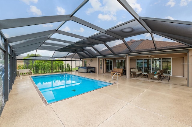 3097 Bureau Path, The Villages, FL 32163 - outdoor pool featuring a hot tub, a patio area, a ceiling fan, an outdoor living space, and glass enclosure