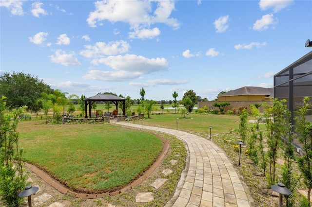3097 Bureau Path, The Villages, FL 32163 - view of grassy yard with a gazebo and glass enclosure