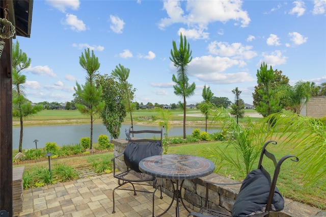 3097 Bureau Path, The Villages, FL 32163 - view of patio with a water view
