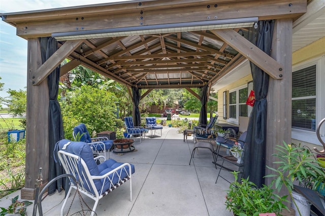 101 Lakeshore Blvd, Saint Cloud, FL 34769 - view of patio featuring an outdoor fire pit and a gazebo