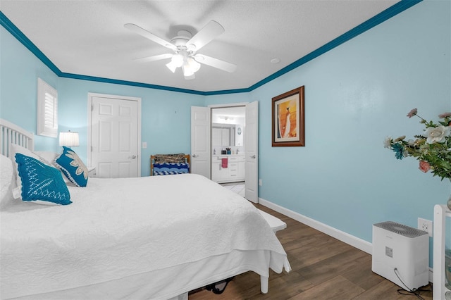 101 Lakeshore Blvd, Saint Cloud, FL 34769 - bedroom with wood finished floors, baseboards, ornamental molding, a textured ceiling, and ensuite bathroom