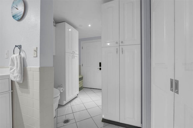 101 Lakeshore Blvd, Saint Cloud, FL 34769 - bathroom featuring a closet, vanity, toilet, tile patterned flooring, and recessed lighting