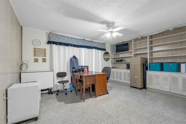 101 Lakeshore Blvd, Saint Cloud, FL 34769 - home office with a ceiling fan, speckle patterned floor, and a textured ceiling