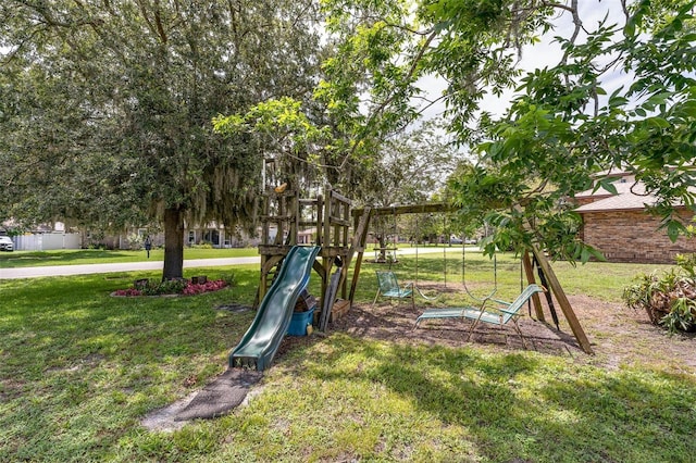 101 Lakeshore Blvd, Saint Cloud, FL 34769 - view of green lawn featuring a playground