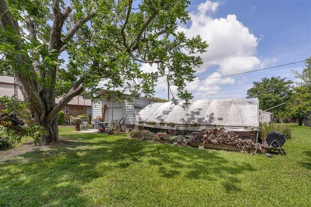 101 Lakeshore Blvd, Saint Cloud, FL 34769 - view of grassy yard with a garage