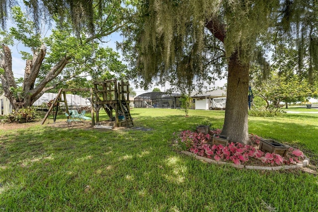 101 Lakeshore Blvd, Saint Cloud, FL 34769 - view of grassy yard with a playground