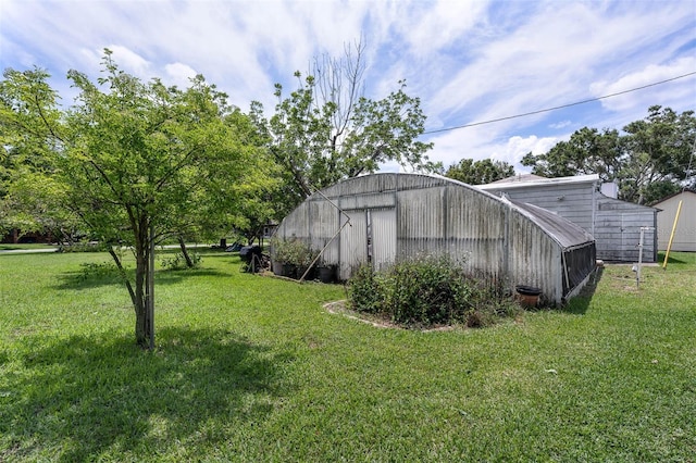 101 Lakeshore Blvd, Saint Cloud, FL 34769 - view of grassy yard featuring an outbuilding and a pole building