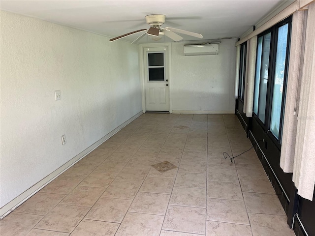 11812 Watts Ct, Tavares, FL 32778 - spare room featuring a ceiling fan, a wall unit AC, light tile patterned floors, and baseboards
