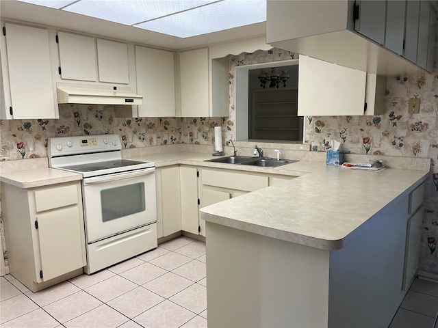 11812 Watts Ct, Tavares, FL 32778 - kitchen with electric stove, under cabinet range hood, light tile patterned floors, a sink, and light countertops