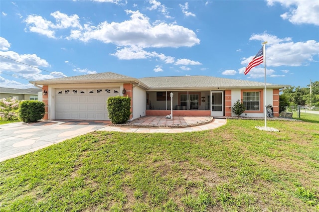 8850 SE 156th St, Summerfield, FL 34491 - single story home featuring driveway, a garage, stucco siding, and a sunroom
