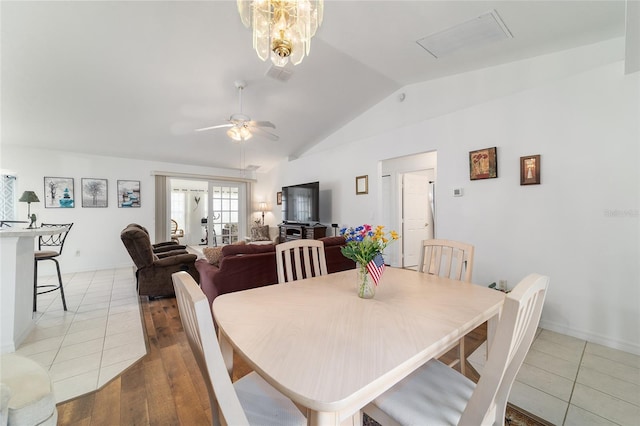 8850 SE 156th St, Summerfield, FL 34491 - dining area with lofted ceiling, ceiling fan, and light wood-style flooring
