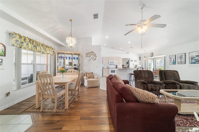 8850 SE 156th St, Summerfield, FL 34491 - living room featuring vaulted ceiling, a chandelier, wood-type flooring, a ceiling fan, and recessed lighting