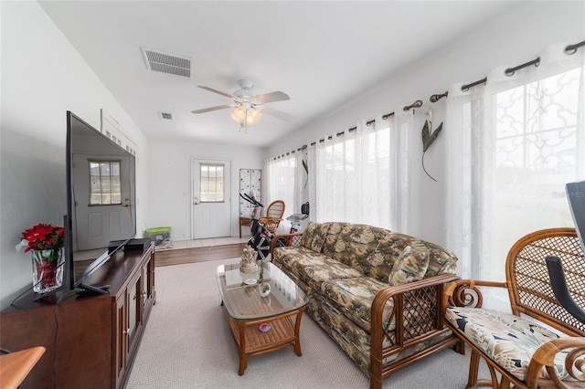 8850 SE 156th St, Summerfield, FL 34491 - carpeted living area featuring a ceiling fan