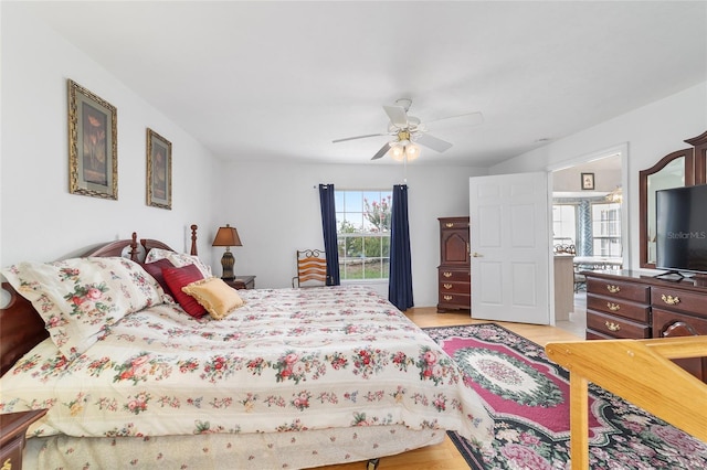 8850 SE 156th St, Summerfield, FL 34491 - bedroom with light wood-type flooring and a ceiling fan