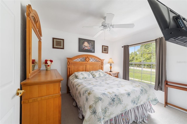 8850 SE 156th St, Summerfield, FL 34491 - carpeted bedroom featuring ceiling fan