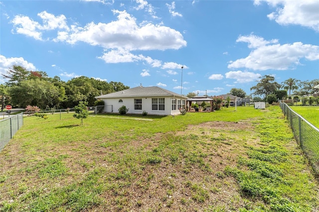 8850 SE 156th St, Summerfield, FL 34491 - fenced backyard with a gazebo