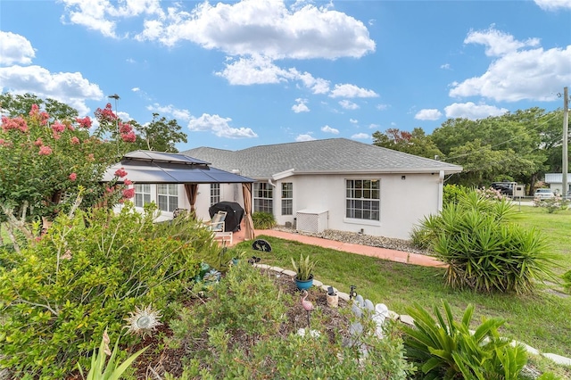 8850 SE 156th St, Summerfield, FL 34491 - ranch-style home with stucco siding and a gazebo