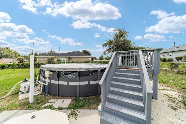 8850 SE 156th St, Summerfield, FL 34491 - view of swimming pool featuring stairs and a yard