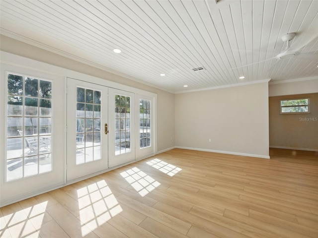 9269 Silver Lake Dr, Leesburg, FL 34788 - empty room with crown molding, french doors, recessed lighting, baseboards, and wood ceiling