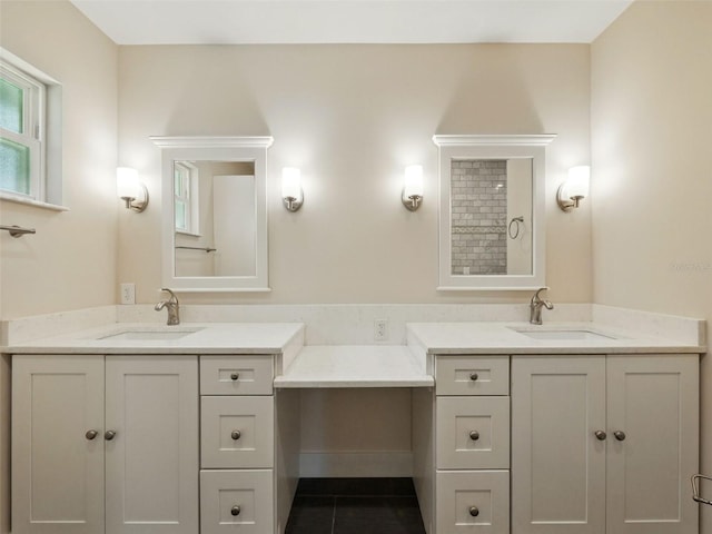 9269 Silver Lake Dr, Leesburg, FL 34788 - full bathroom with two vanities and tile patterned floors