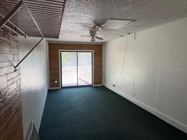 1109 Willow Ct, Tavares, FL 32778 - empty room with ceiling fan, baseboards, and carpet