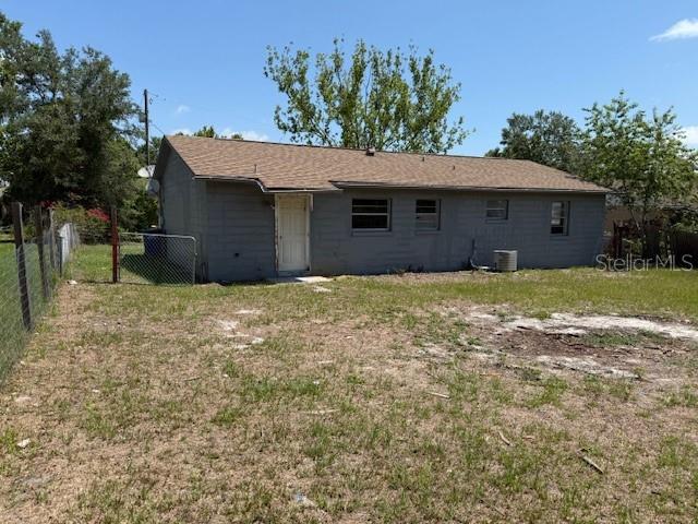 1109 Willow Ct, Tavares, FL 32778 - rear view of property with cooling unit