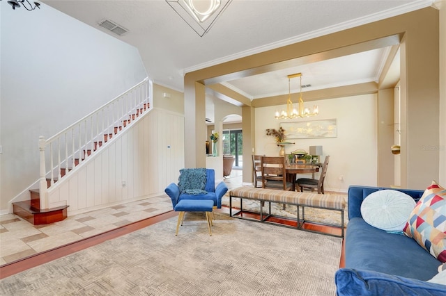 107 Wekiva Pointe Cir, Apopka, FL 32712 - living area with stairs, arched walkways, crown molding, a chandelier, and baseboards