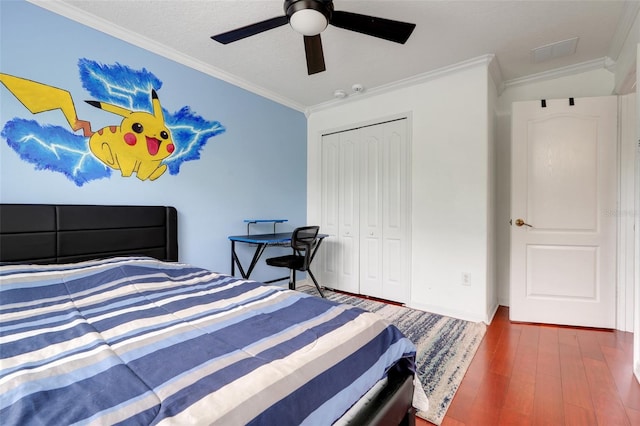 107 Wekiva Pointe Cir, Apopka, FL 32712 - bedroom with ornamental molding, a closet, wood finished floors, ceiling fan, and baseboards