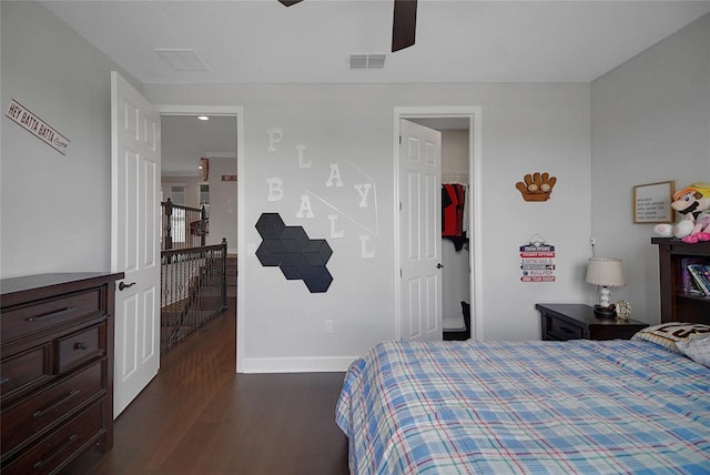 14501 Wabasso Loop, Winter Garden, FL 34787 - bedroom featuring dark wood-type flooring, baseboards, and a ceiling fan