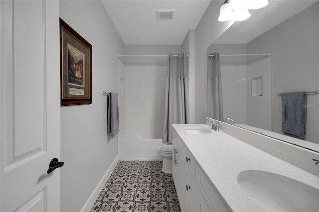 14501 Wabasso Loop, Winter Garden, FL 34787 - bathroom featuring shower / bath combo with shower curtain, double vanity, toilet, baseboards, and tile patterned floors