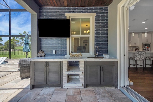 14501 Wabasso Loop, Winter Garden, FL 34787 - view of patio featuring glass enclosure