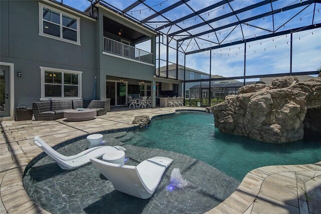14501 Wabasso Loop, Winter Garden, FL 34787 - swimming pool featuring outdoor lounge area, a patio area, and glass enclosure