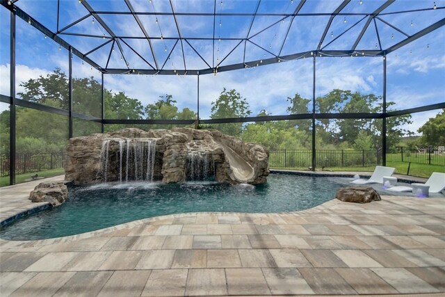 14501 Wabasso Loop, Winter Garden, FL 34787 - view of pool with a water slide and a patio area