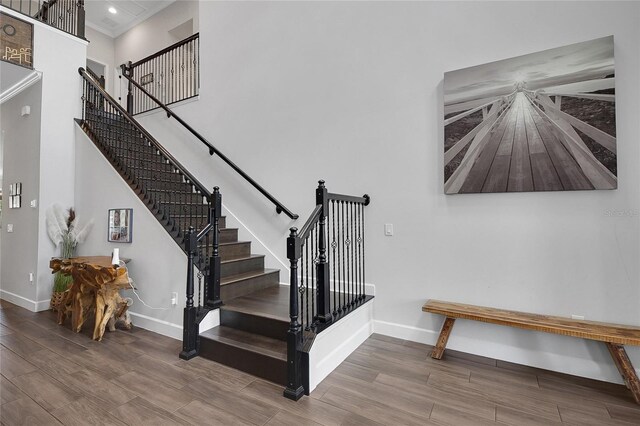 14501 Wabasso Loop, Winter Garden, FL 34787 - staircase with wood finished floors and recessed lighting