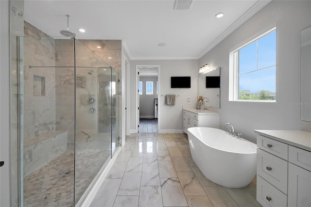 14501 Wabasso Loop, Winter Garden, FL 34787 - full bath featuring vanity, a stall shower, crown molding, a soaking tub, and marble look tile flooring