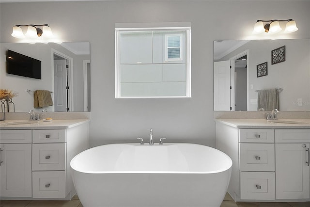 14501 Wabasso Loop, Winter Garden, FL 34787 - full bath with two vanities and a freestanding tub