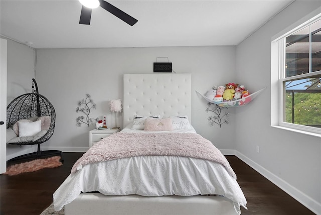 14501 Wabasso Loop, Winter Garden, FL 34787 - bedroom featuring wood finished floors and a ceiling fan