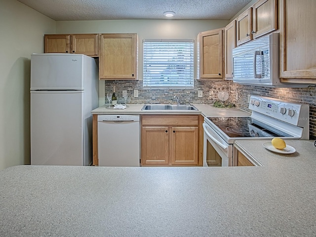 2799 Privada Dr, The Villages, FL 32162 - kitchen featuring white appliances, decorative backsplash, light countertops, a textured ceiling, and light brown cabinets