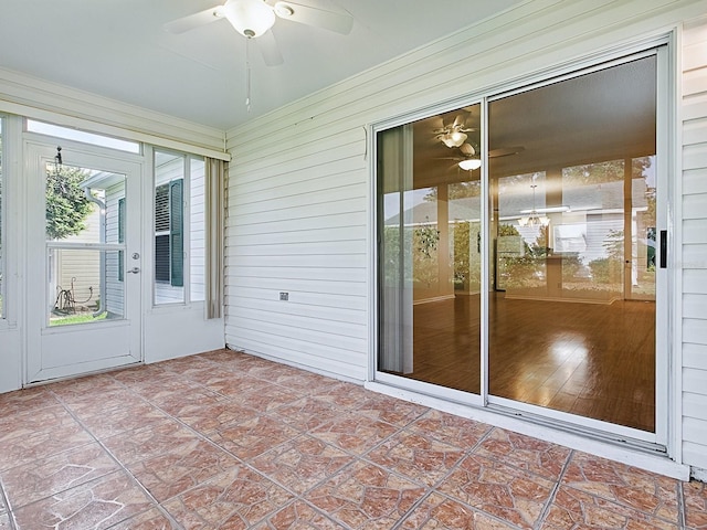 2799 Privada Dr, The Villages, FL 32162 - unfurnished sunroom with ceiling fan