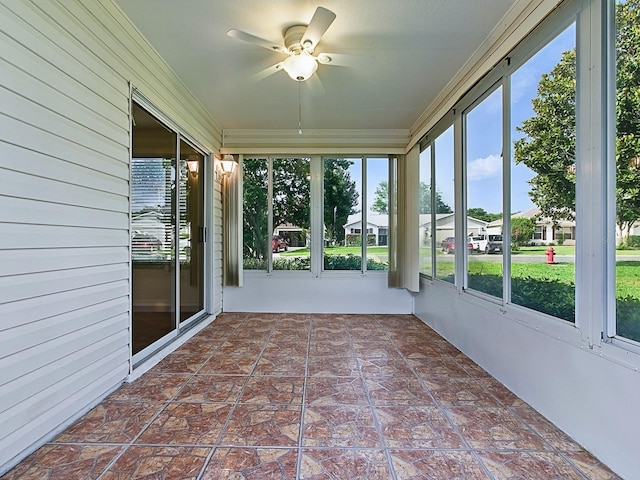 2799 Privada Dr, The Villages, FL 32162 - unfurnished sunroom with a ceiling fan and healthy amount of natural light