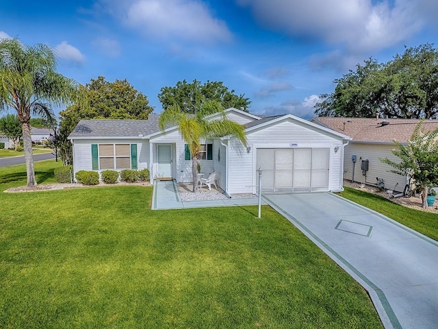 2799 Privada Dr, The Villages, FL 32162 - ranch-style house featuring a garage, concrete driveway, and a front lawn