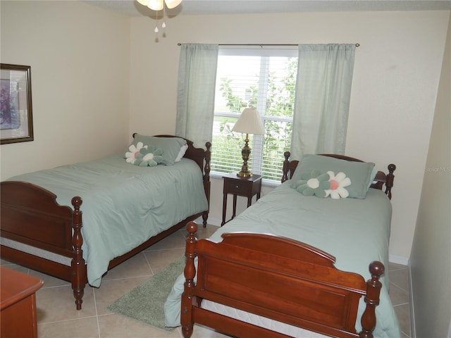 8377 SE 177th Bartram Loop, The Villages, FL 32162 - bedroom with tile patterned flooring